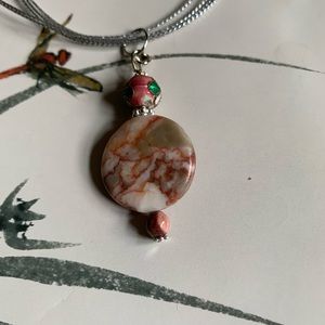 3/$50 Beautiful pink line jasper pendant necklace
